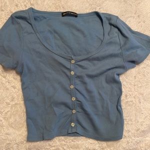 Brandy Melville. Baby Blue button up crop top. Size small